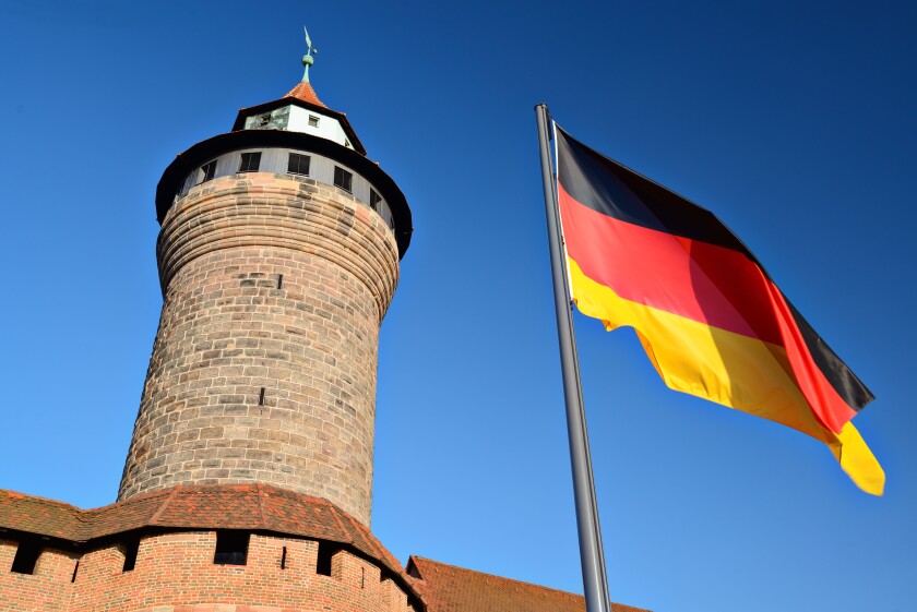 German flag flies at Nuremberg Castle in Nuremberg, Germany.