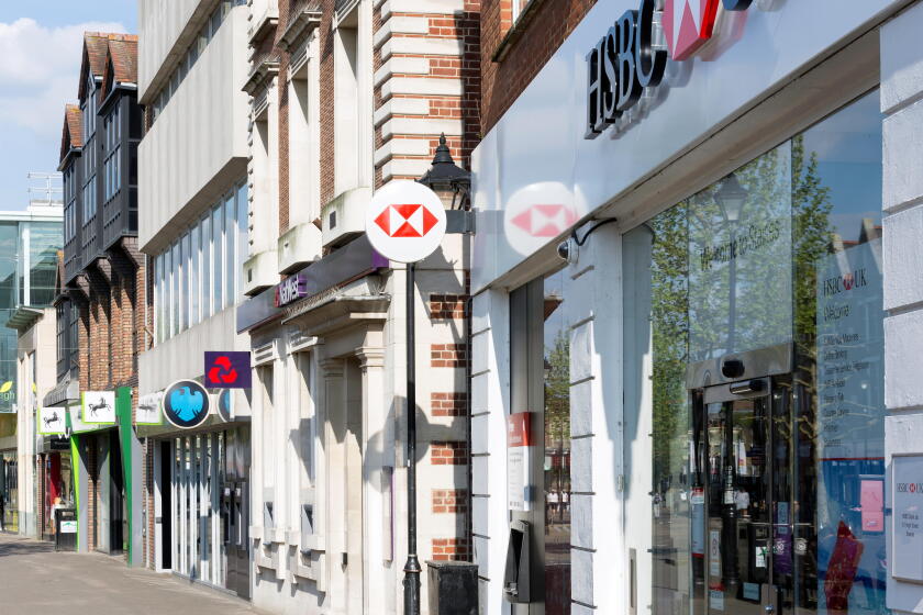 Row of high street banks (Lloyds, Barclays, Nat West & HSBC), High Street, Staines-upon-Thames, Surrey, England, United Kingdom