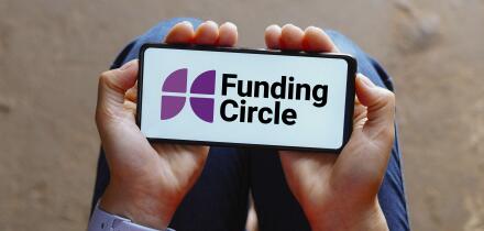 In this photo illustration, the Funding Circle logo is displayed on a smartphone screen