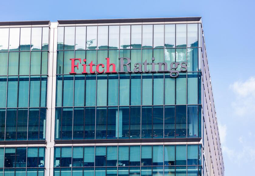 Fitch Ratings Agency logo on their building in Canary Wharf, Docklands, London, UK