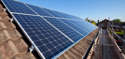 solar panels being installed on house roof england uk gb europe solar panels on roof uk
