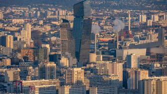 Paris, France - 03 03 2026: Montparnasse Tower: View of tower BPCE Est at sunset from the rooftop