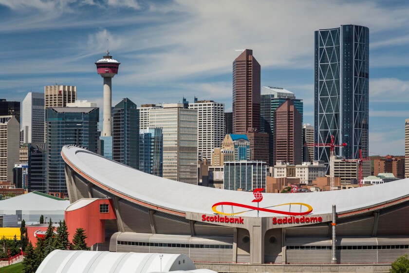 The Scotiabank Saddledome and the city skyline of Calgary, Alberta, Canada