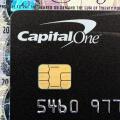 A Capital one credit card close up showing chip and pin contact England UK