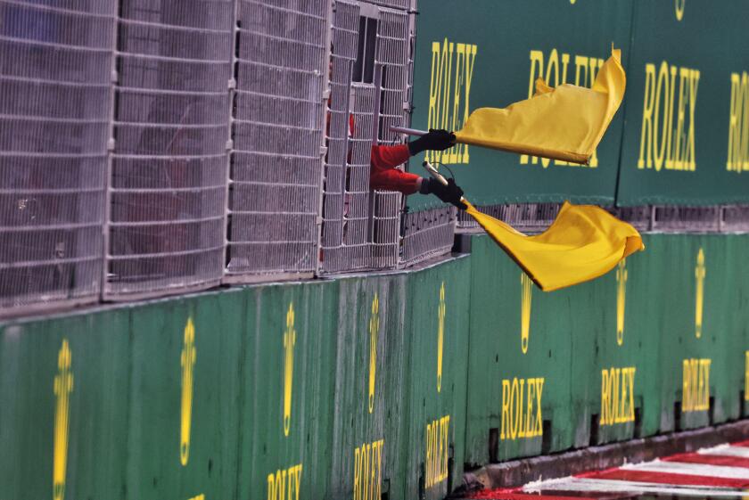 Circuit atmosphere - waved yellow flags.
01.10.2022. Formula 1 World Championship, Rd 17, Singapore Grand Prix, Marina Bay Street Circuit, Singapore, Qualifying Day.
Photo credit should read: XPB/Press Association Images.