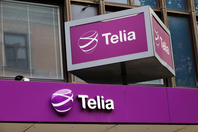 Sundsvall, Sweden - May 30, 2016: The Telia retail shop sign above the entrance to its shop at Storgatan street.