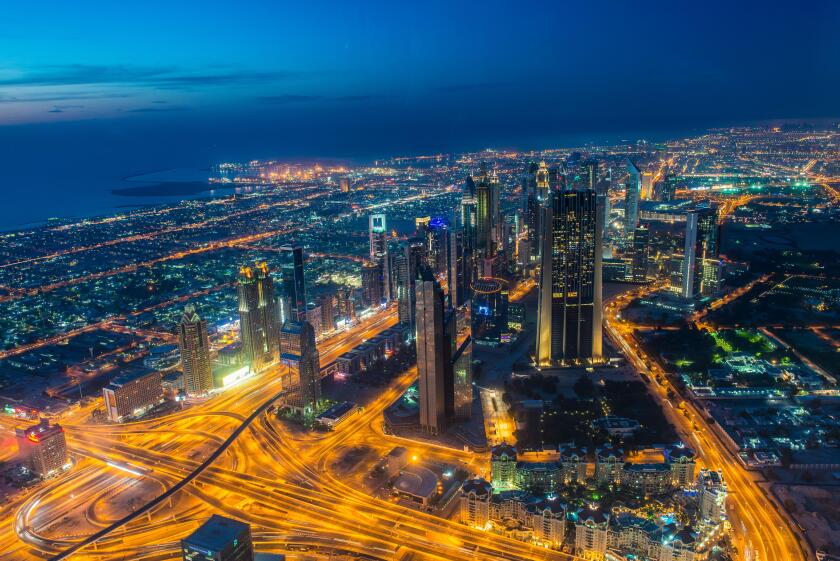 View over Dubai from Burj Khalifa at night, Dubai, United Arab Emirates, Middle East
