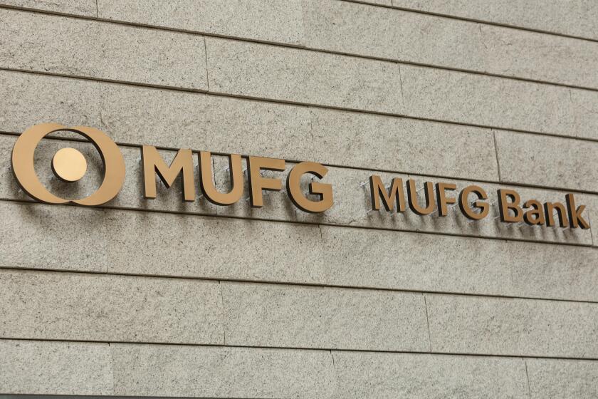 A new signboard of MUFG Bank on display outside its branch on April 2, 2018, Tokyo, Japan. Mitsubishi UFJ Financial Group Inc. changed the name of Bank of Tokyo-Mitsubishi UFJ to MUFG Bank after 11 years of merger and complaints from customers saying that
