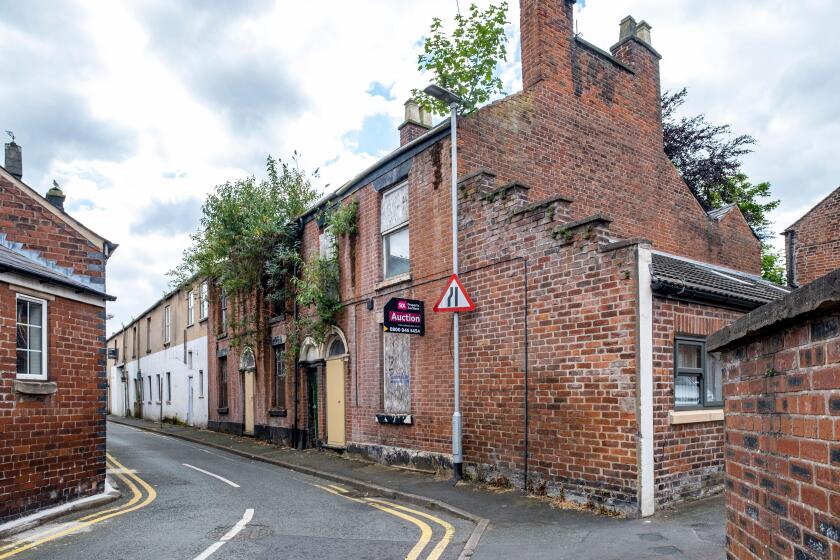Derelict houses in town centre of Congleton Cheshire UK