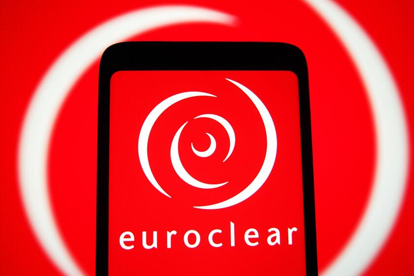 In this photo illustration, Euroclear logo seen displayed on a smartphone screen.