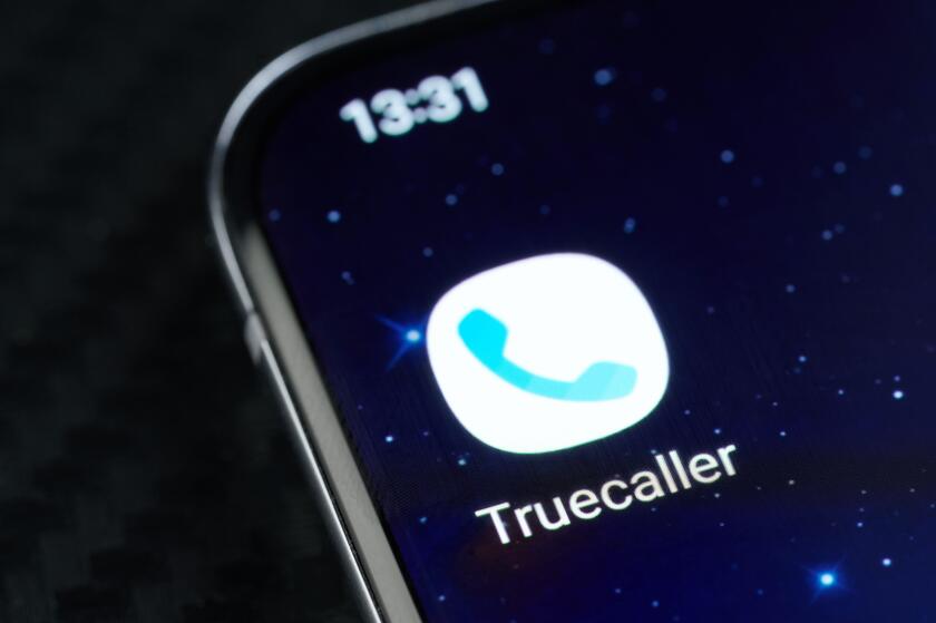 New york, USA - May 5, 2022: Truecaller mobile app on smartphone screen close up view