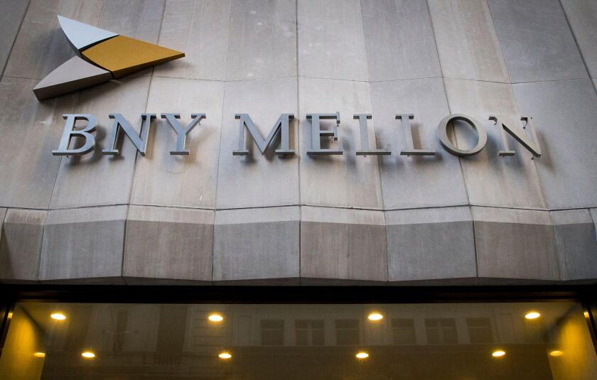 The Bank of New York Mellon Corp. building at 1 Wall St. is seen in New York's financial district March 11, 2015. REUTERS/Brendan McDermid (UNITED STATES - Tags: BUSINESS)