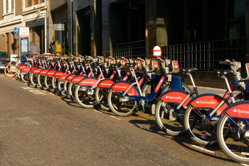 Santander rental bikes in a London street, London, United Kingdom.