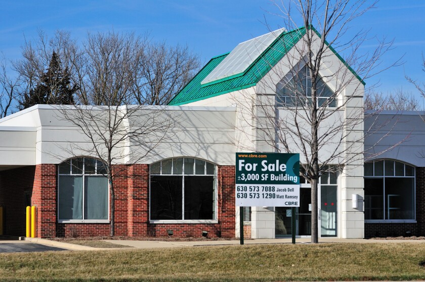 Vacant building representing the abundance of available commercial real estate space on the market. St. Charles, Illinois, USA.