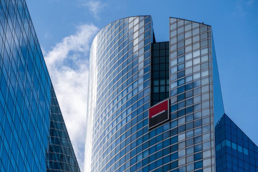 Puteaux, France - November 12, 2020: Exterior view of Societe Generale twin towers, headquarters of the French bank located in Paris-La Defense