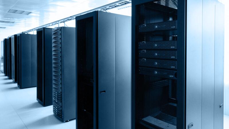Room with rows of server hardware in an internet data center