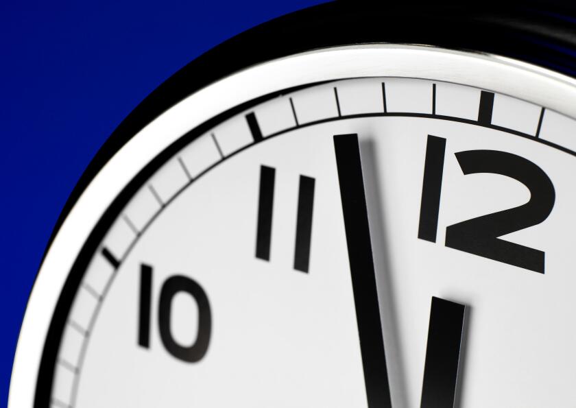 Close up clock face at 12 O'Clock