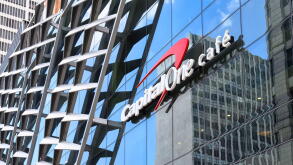 Logo of Capital One on the modern facade of a building.
