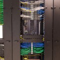 Ethernet cables and sockets neatly arranged in the server racks of a data center at some Hong Kong serviced offices.