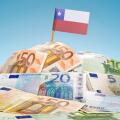 The national flag of Chile sticking in a pile of mixed european banknotes.(series)
