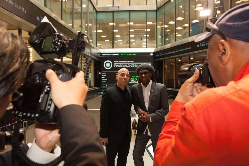 London, UK. 11th July 2018. Nile Rodgers and business manager Merck Mercuriadis attended the London Stock Exchange today to float their company Hipgnosis Songs. Rodgers is an Advisory Board Member and Mercuriadis is the CEO and Founder. Credit: Anna Watso