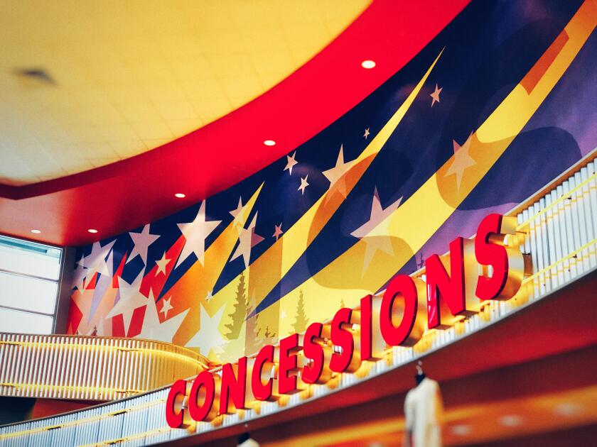 Concessions sign in mega screen movie theater in US