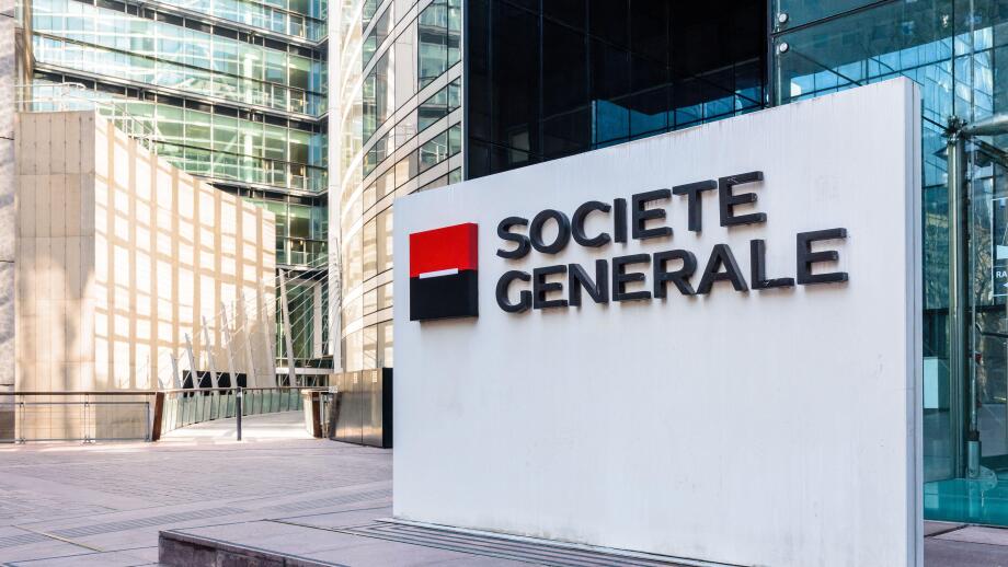 Sign of the Societe Generale at the entrance of the head office of the french banking group in La Defense business district.