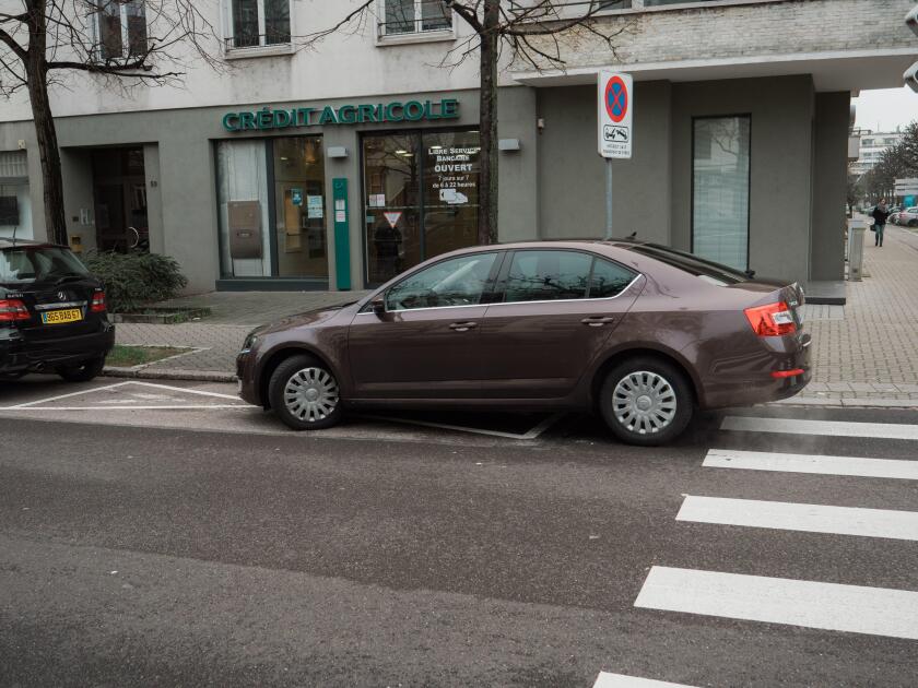 Strasbourg, France - Jan 27, 2018: Parked Skoda Octavia in street near Credit Agricole Branch