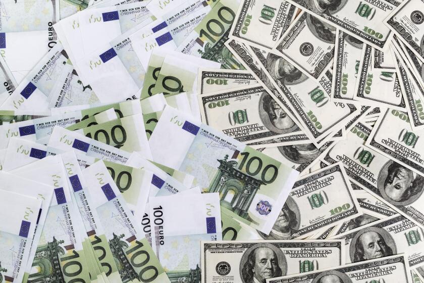 Dollars and euros. Image shot 09/2017. Exact date unknown.