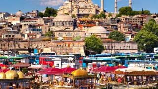 The Suleymaniye Mosque  on the Third Hill with a ferries on the banks of the Golden Horn, Istanbul Turkey
