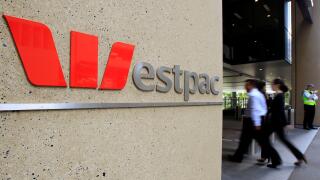 People walk past the headquarters of Westpac in Sydney, Australia, Wednesday, May 4, 2011. Westpac Banking Corp., one of Australia's largest lenders, said that its first-half profit rose 38 percent as bad debt charges fell. (AP Photo/Rick Rycroft)
