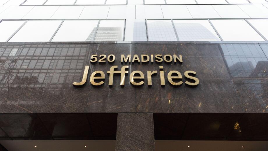 Jefferies Group LLC headquarters entrance sign at 520 Madison Avenue, Midtown Manhattan, New York City, USA
