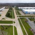 Aerial view of industrial warehouses and parking