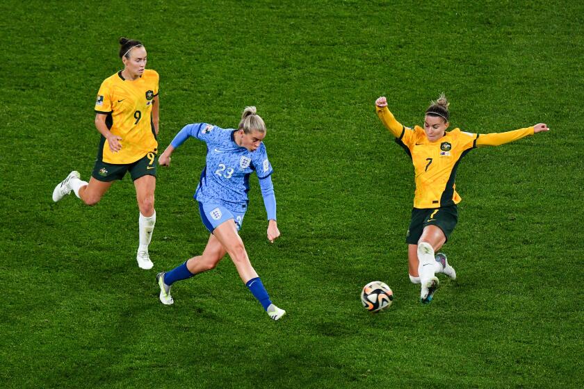 Sydney, Australia. 16th Aug, 2023. Alessia Russo of England is tackled by Steph Catley of Australia during the FIFA Women's World Cup 2023 Semi Final soccer match between Australia and England at Stadium Australia in Sydney, Wednesday, August 16, 2023. (A