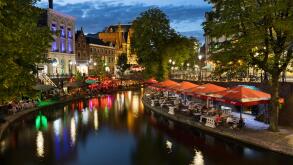 Bars and restaurants along Oudegracht canal come alive at night in Utrecht