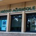 Narbona, France - June 18, 2024: Sign and logo of Credit Agricole bank office in Narbona or Narbonne, Occitanie, France