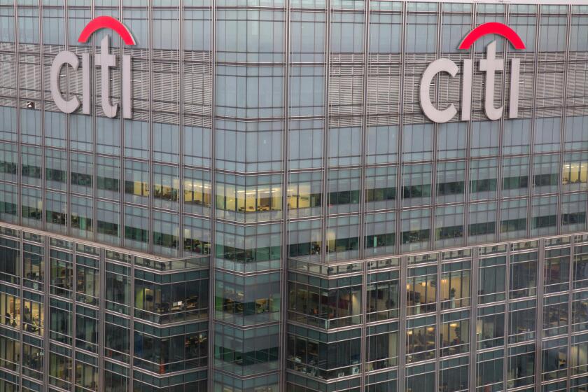 The top of the Citibank building at 25 Canada Square in Canary Wharf, London.