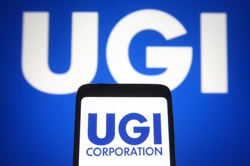 Ukraine. 9th May, 2021. In this photo illustration, the UGI Corporation logo of the US natural gas distribution company seen on a smartphone and on a pc screen. Credit: Pavlo Gonchar/SOPA Images/ZUMA Wire/Alamy Live News