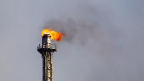 Refinery flare - Burning of dangerous gases in the oil field.
