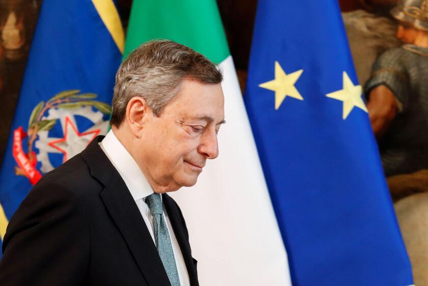 Italian Prime Minister Mario Draghi leaves at the end of his statement on the Ukraine crisis, in Rome, Italy, February 24, 2022. Remo Casilli/REUTERS/Pool