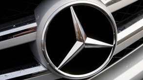 A Mercedes- Benz car dealership. 