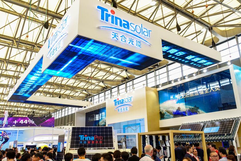 People visit the stand of Trina Solar during the SNEC 2018 PV Power Expo in Shanghai, China, 28 May 2018.

Trina Solar, based in Changzhou city, east