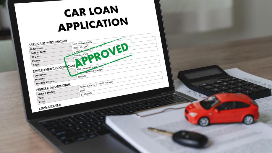Online car loan application form displayed on laptop with calculator, vehicle model, financial documents, and car key for digital financing, banking a