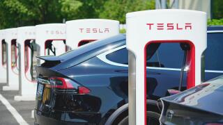 Tesla charging station to welcome electric car owners. Turin, Italy - June 2022