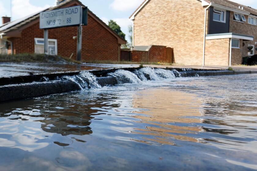 A new water leak flooding the road on Ladysmith Road, Cheltenham. 23rd July 2018