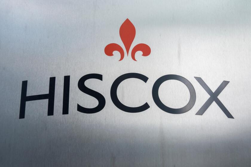Signage outside Hiscox, a small business insurer and home insurance company on Great St Helens, London, UK