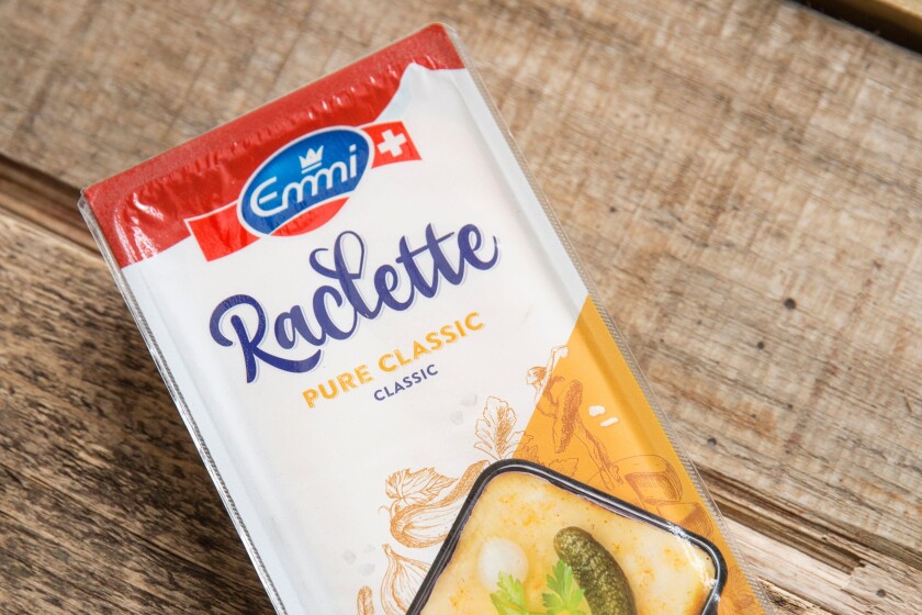Sliced Emmi Raclette cheese bought from a supermarket in the UK. England UK GB