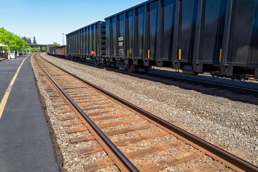 Freight cars waiting for a locomotive at the railroad station in Albany, Oregon, USA