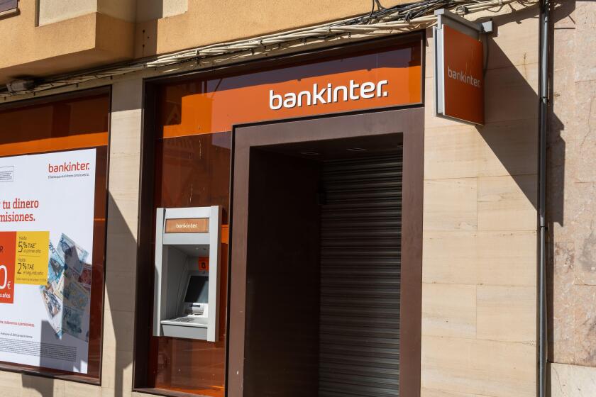 Manacor, Spain; may 14 2022: Closed bank office and ATM of the multinational bank Bankinter. Manacor, island of Mallorca, Spain