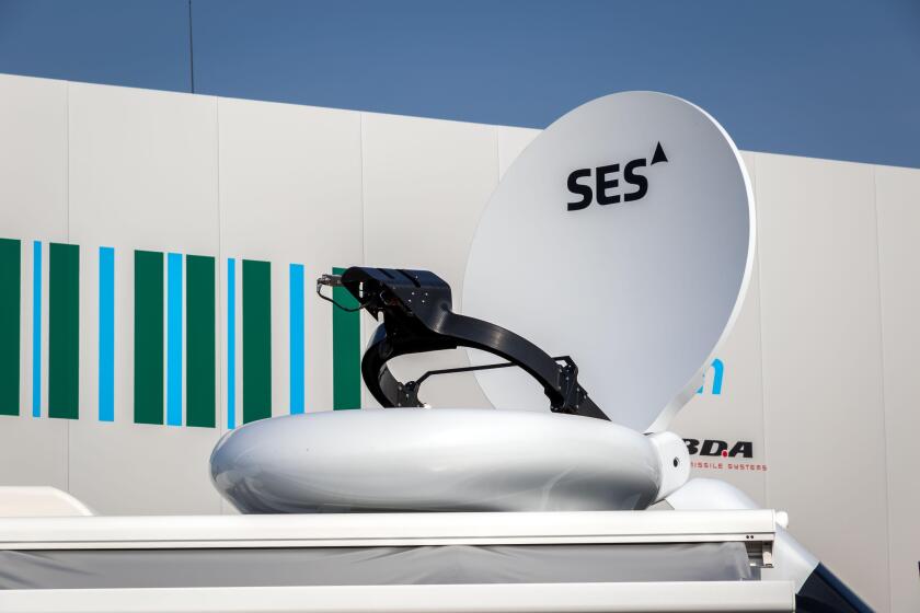 SES Satellites satellite dish on top of a vehicle. Paris, France - June 22, 2017